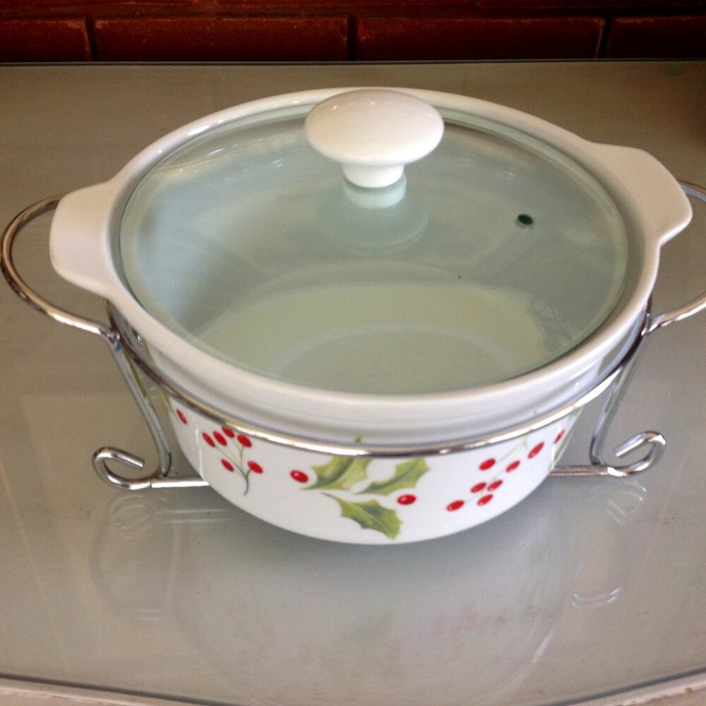 Ceramic Casserole Dish with a Glass Lid and a Metal Stand
